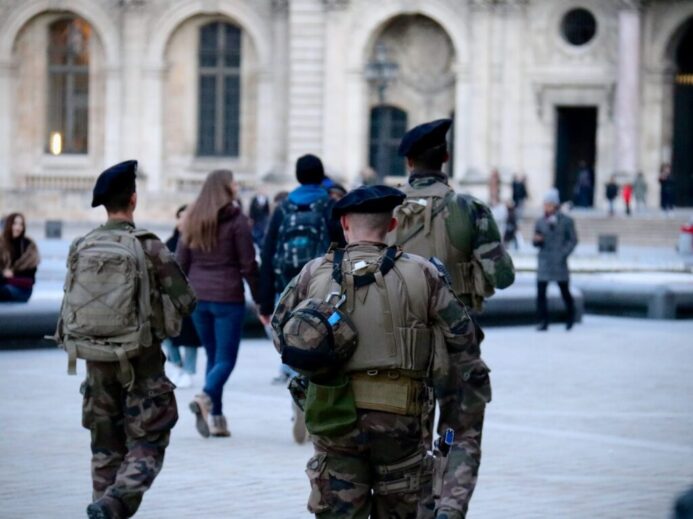 men in army uniform near building during daytime