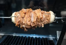 Raw Meat on a Metal Grill