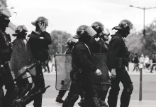 group of police grayscale photo