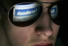 Man posting on facebook