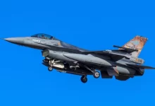 gray fighter jet flying in the sky