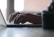 person using laptop