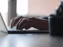 person using laptop