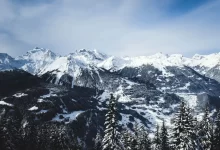 snow covered mountain during daytime