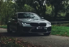 black bmw m 3 parked on road during daytime