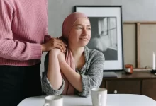 A Person Holding Hands with a Woman
