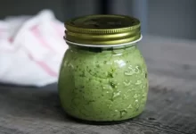 clear glass jar on gray surface