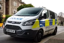 white and blue police car