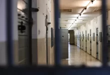 a long hallway with a bunch of lockers in it