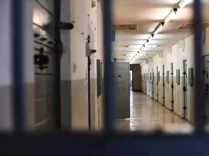 a long hallway with a bunch of lockers in it