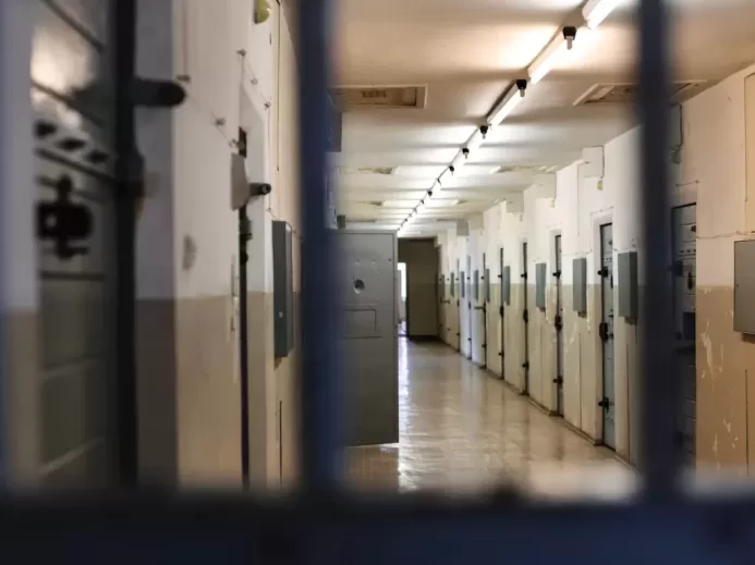 a long hallway with a bunch of lockers in it