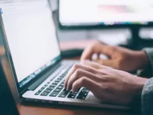 person using MacBook Pro