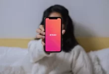 A Woman Showing Her Smartphone