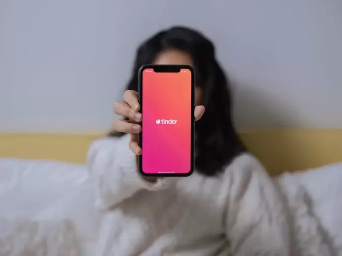 A Woman Showing Her Smartphone
