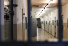 a long hallway with a bunch of lockers in it