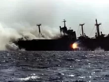 Cargo ship under attack during Iran-Iraq war