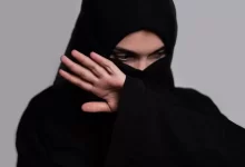 Afghan woman in black islamic clothes