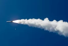 A tomahawk cruise missile launches from the Arleigh Burke-class guided-missile destroyer USS Shoup