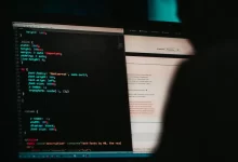 flat screen computer monitor displaying white and black screen