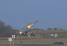 Naval Strike Missile streaks out to sea before striking a naval target ship off the coast of Kauai