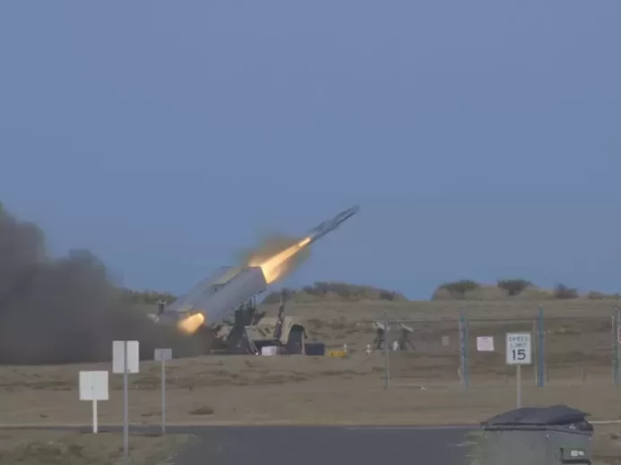 Naval Strike Missile streaks out to sea before striking a naval target ship off the coast of Kauai