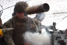 U.S. Marine and New Zealand gunners fire cannons in snowstorm to conclude Exercise Brimstone [Image 9 of 19]