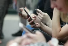 person holding black phone