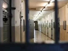 a long hallway with a bunch of lockers in it