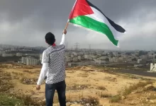 man waving flag