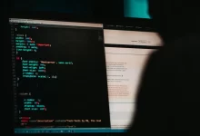 flat screen computer monitor displaying white and black screen