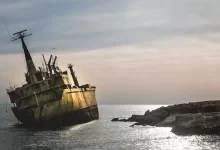 white ship docked near island