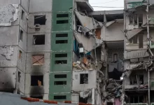An Apartment Building Ravaged by War