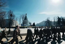 people walking on snow covered ground during daytime
