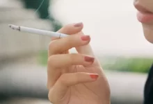 woman smoking cigarette