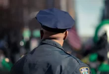 man wearing police uniform selective focus photo