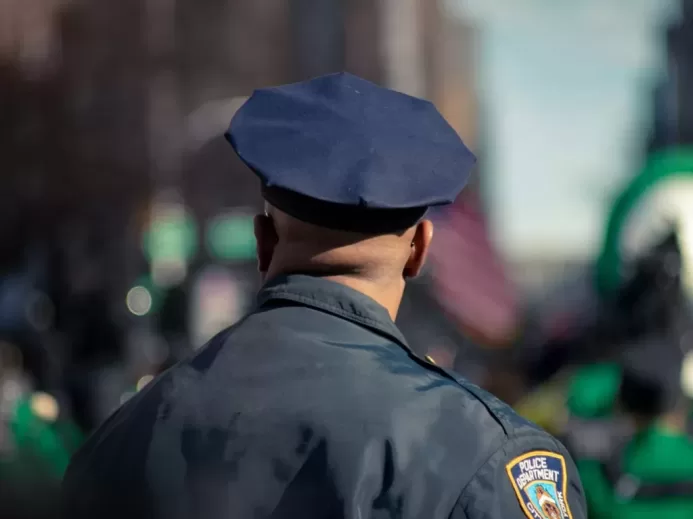 man wearing police uniform selective focus photo