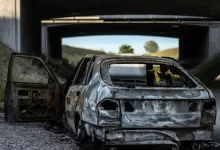 white and black car in garage