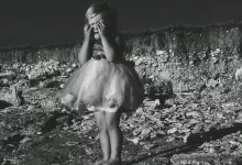Grayscale Photo of a Girl Crying