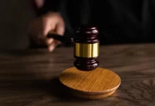 Brown Wooden Gavel on Brown Wooden Table