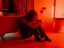A Woman Crying in the Bathroom