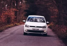 white and black volkswagen t-1 on road during daytime