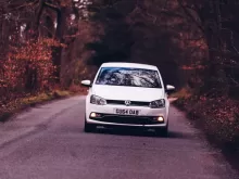 white and black volkswagen t-1 on road during daytime