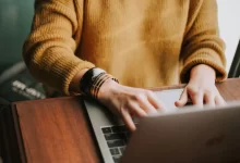 person using laptop computer