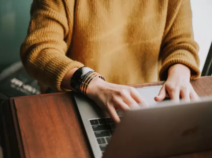 person using laptop computer