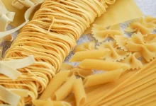 yellow pasta on white paper