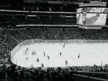 ice hockey players on ice hockey arena