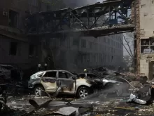 Building and Car Damaged by Fire 