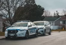 Zdroj Blue and White Police Car on Road