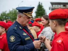 Military Man Talking to Students