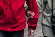 person wearing red jacket